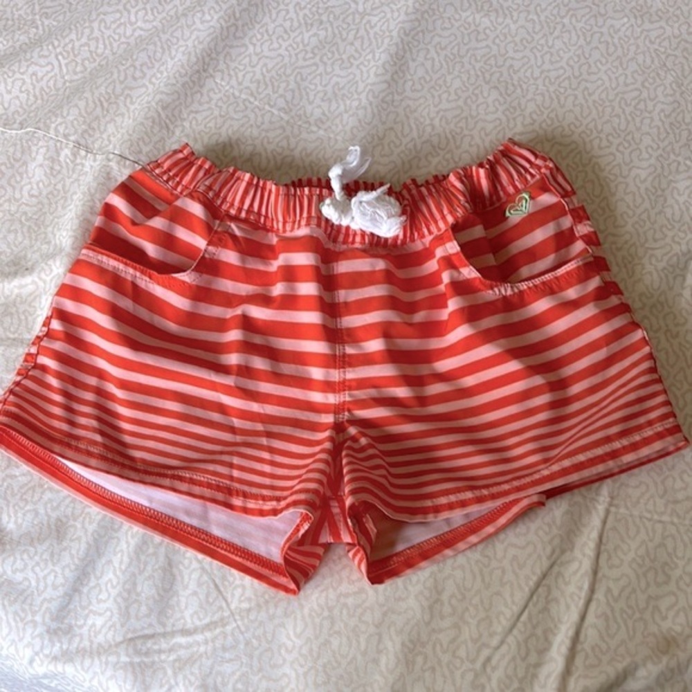 Roxy girls orange and pink striped board shorts in size 14/xl
